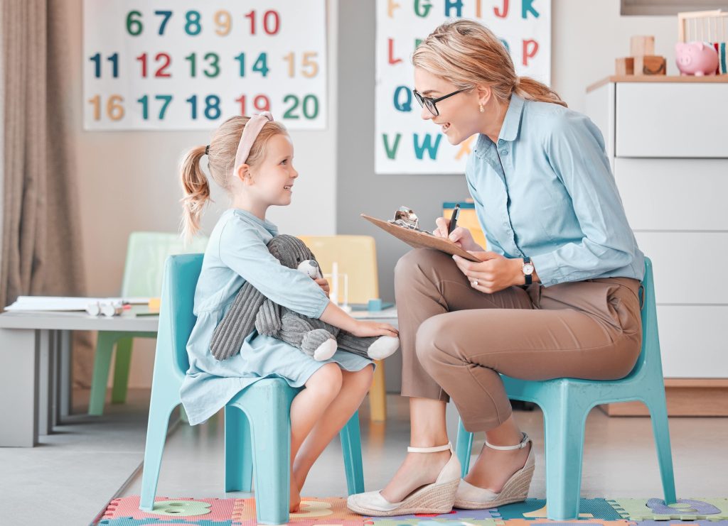 Behavior therapist with a child at ABA therapy