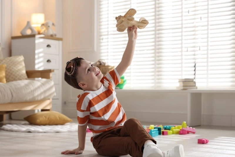 ABA therapy supporting children with autism during summer routine transitions at home