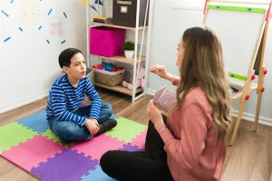 Child practicing communication skills during ABA therapy in Herndon VA
