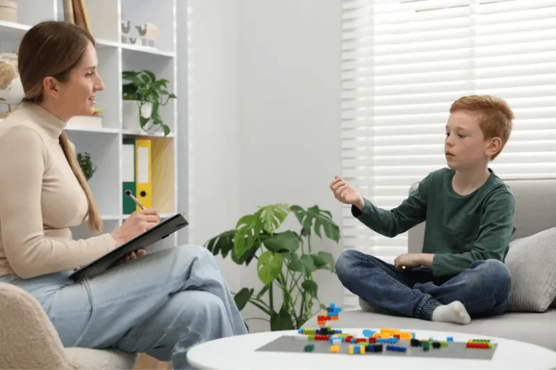 Child meeting with an ABA therapist during an assessment-style session in Frederick MD