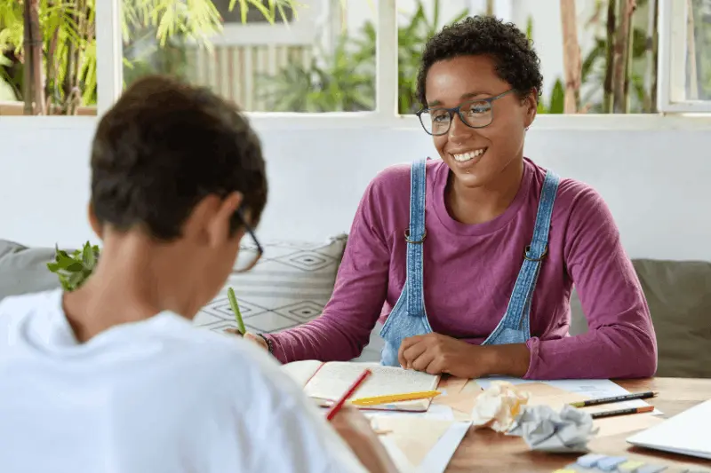 Teen working with a therapist on life skills during ABA therapy in Herndon, VA